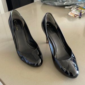 Cole Haan black patent pumps 11 B Nike Air gently used